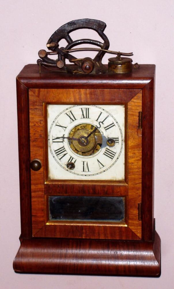 Seth Thomas Clock Co., Plymouth Hollow, Conn., Circa 1860, 30-hour time/alarm "Procter's patent Burglar and Fire-Detective clock" novelty mantel clock. — Antique Clocks Price Guide