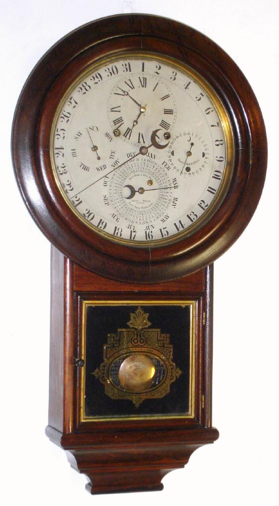 D. J. Gale, "Drop Calendar No. 2", mfg by Welch, Spring and Co., Forestville, Conn, with full perpetual calendar correcting for short months and leap year and in addition with an equation dial that indicates the time of sunrise and sunset for every 7th day. Additional dials show the day of the week and the 29 days for phases of the moon, rosewood case, 8-day, gong striking. C.1875, mov't stamped "Pat'd Aug 30, 1870" — Antique Clocks Price Guide