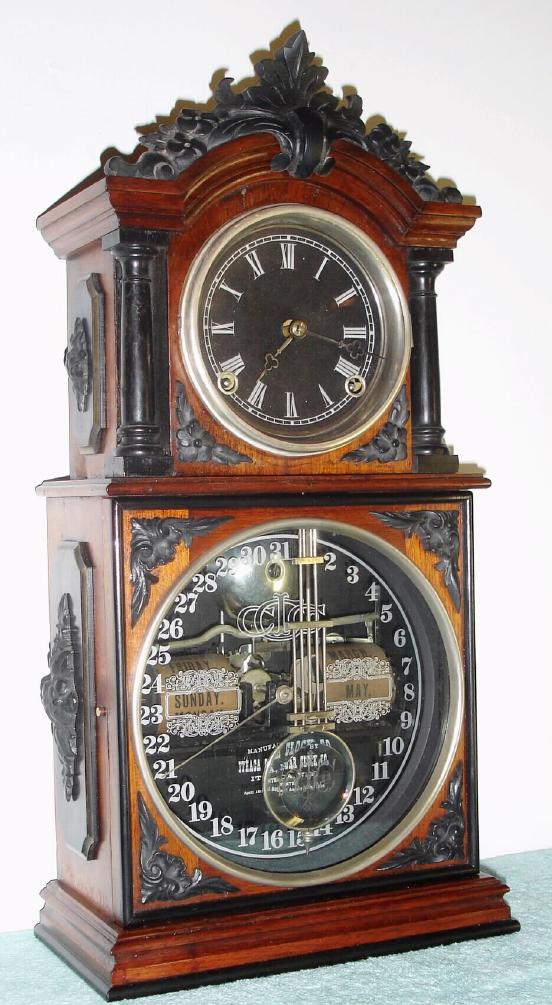Ithaca Calendar Clock Co., PARLOR 3 1/2 double dial perpetual calendar, earlier version with 2-piece dust cover in rear, 8-day time w/ bell strike. — Antique Clocks Price Guide