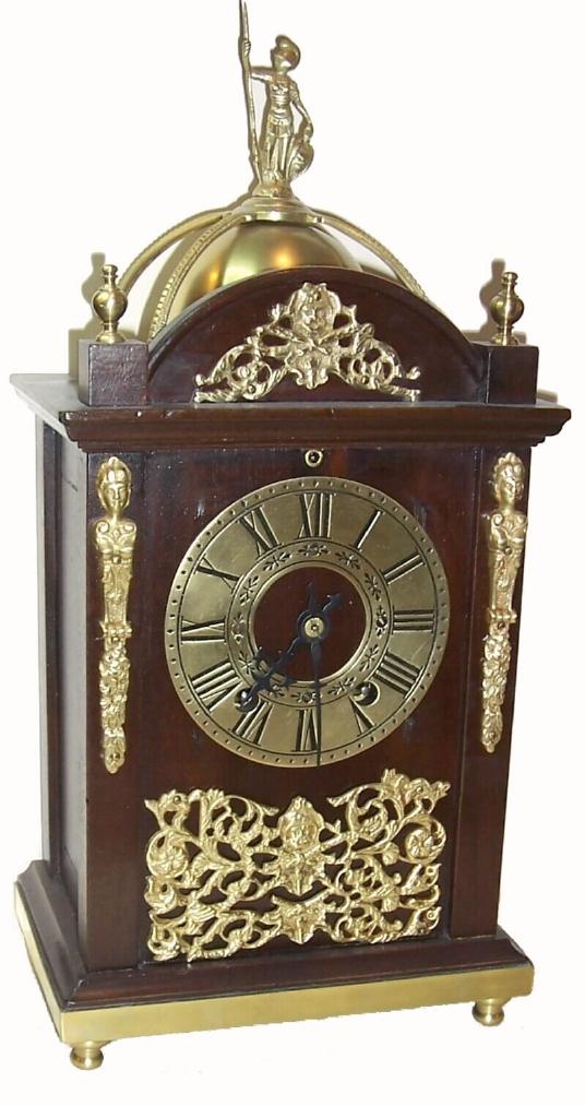 New Haven Clock Co, ANITA model cabinet clock, [after 1900], previously know as "Cabinet No. 10", richly ornamented in cast brass trimmings, week duration with cathedral gong, C.1900. Mahogany case. — Antique Clocks Price Guide