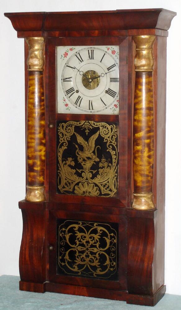 Seth Thomas Clock Co, SHELL COLUMN (large), C.1870, with eagle eating snake in urn and gilt scroll tablets, 2-weight, gong striking. — Antique Clocks Price Guide