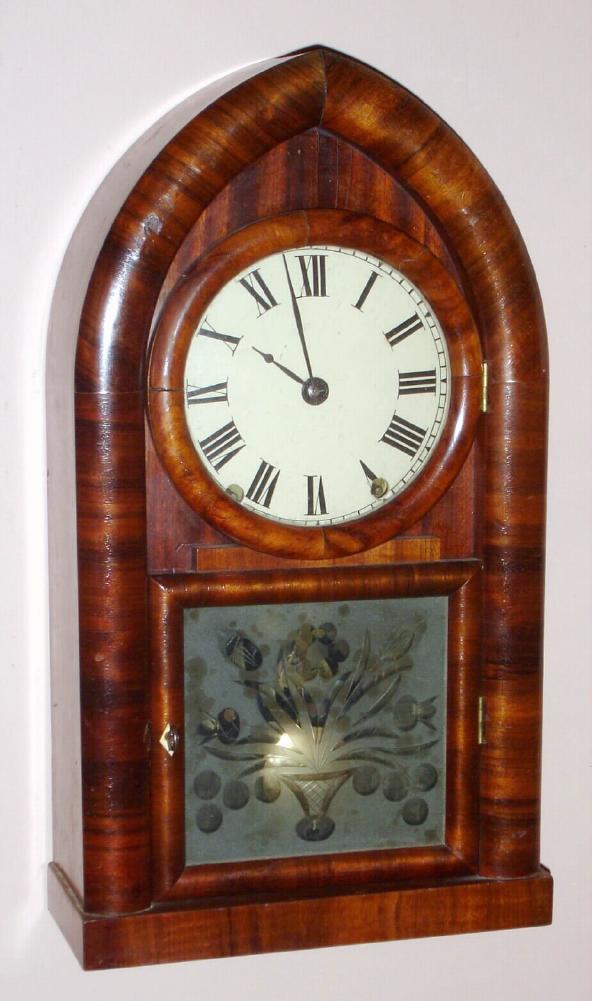 Brewster and Ingrahams, Bristol, Conn, C.1845, Kirk's patent iron back plate, repeating mov't [rack strike] in a beehive case with mahogany veneer. — Antique Clocks Price Guide
