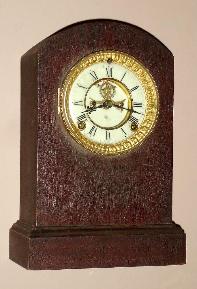 Ansonia Clock Co. New York, U.S.A. "HARWICH" model 8 day time and strike spring driven No. "6 1/2" movement in mahogany veneered case with Roman numeral porcelain 4" dial with exposed escapement, c1914 — Antique Clocks Price Guide