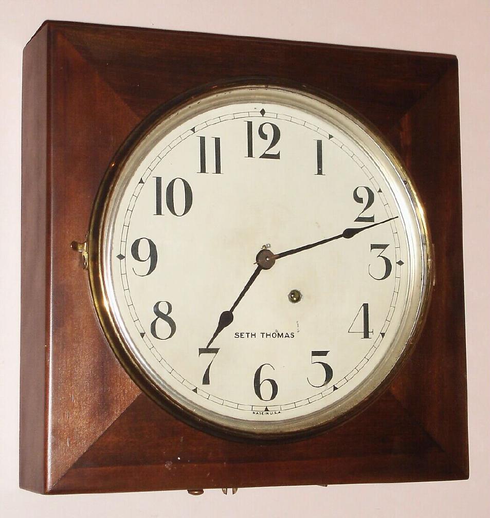 Seth Thomas Clock Co., C.1925, "OFFICE No. 1" timepiece, in a square poplar case with mahogany finish, 12 inch Arabic dial. — Antique Clocks Price Guide