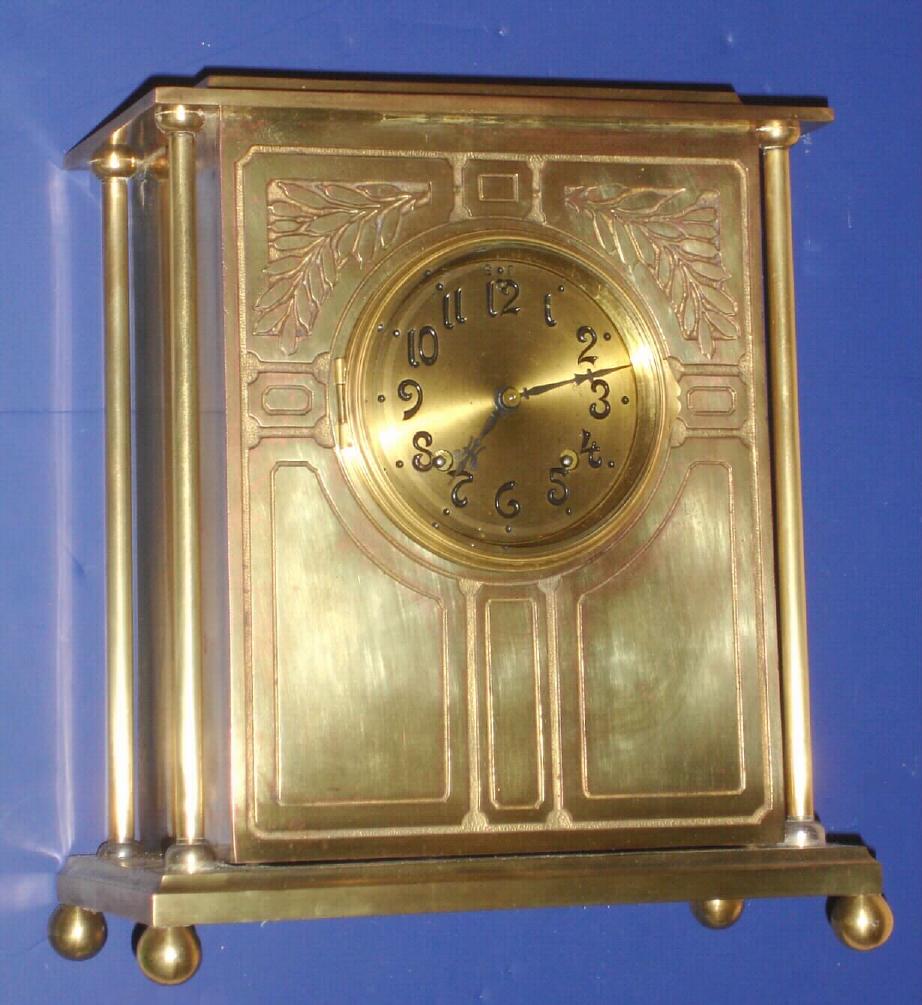 Ansonia Clock Co., NEW YORK model brass over cast iron mantel clock, 8-day time and strike. — Antique Clocks Price Guide