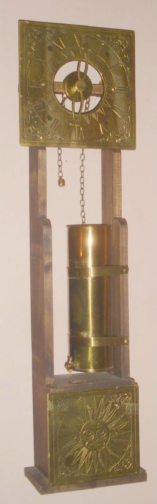 English, Reproduction Celpsydra or water clock, classic Anglo design with a cylinder that drips water into a cistern below, and then the water is re-transferred to the cylinder for "re-winding", c.1980. Water flow is regulated by a small valve at the bottom of the cylinder. — Antique Clocks Price Guide