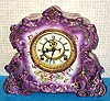Ansonia Clock Co., C.1895, Standard Line, "REPORTER" porcelain china cased clock, with 8-day, gong strike mov't, with open escapement on the dial, in Violet.