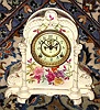 Ansonia Clock Co., Royal Bonn, "No. 500", porcelain clock in the French style, with open escapement on the dial center. interesting case style with garlands around the side columns.