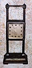 Ansonia Clock Co. New York, "GRAVITY CLOCK", 36 hour duration from top to bottom, simply raise the clock on the rack to wind.