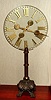 French, Early 20th Century, MYSTERIOUS timepiece, two gilt hands attached to a large glass dial. A Swiss watch movement in each hand, one geared to turn once an hour, the other designed to turn once in 12 hours. See detail fotos of movement and also pivoted counter balance on opposite side of hand.