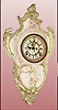 Ansonia Clock Co., C.1906, Royal Bonn, "PORCELAIN HANGING No. 3" china cased wall clock, with floral pattern to case, pendulum movement, gong striking, 8-day. Cream colored case has light green and aqua accents with gold highlights, and multi colored flowers.
