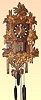 German, Emilian Wehrle, Furtwangen, 8-pipe wall hanging flute clock, time, gong strike and musical tune, 3-weight, chain driven case of carved oak leaves, and with nest of birds at top.