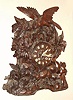 German, Large Black Forest shelf cuckoo, 2-fusee, brass mov't, 8-day duration, forest scene with deer at base and large cuckoo bird at top.