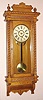 Ansonia Clock Company, New York, "QUEEN CHARLOTTE" oak cased, 8-day timepiece, spring.