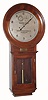 Warren Telechron Co., Ashland, Mass, C. 1925, "Warren 'B' Master Clock", (No. 127 Frequency Clock), in a walnut case, and silvered dial, 110v motor combined with quality spring mov't. Spring mov't moves the center hand backwards; electric mov't moves it forward. Cord was disconnected after checking. It is inside case. Note that you should attach cord and just plug it in; there is NO need to ever wind it again. An additional note is if you stop the pendulum and leave the electric motor running, it can strip off the 'scape teeth {something has to give}.