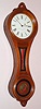 E. Howard and Co., Boston, C.1890, "REGULATOR No. 9", figure 8 wall clock in walnut, weight driven, eight day.