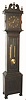 American, fumed oak tall case clock, probably by Ithaca Clock Co., 2-weight ladder chain movement striking on gong. C.1910.