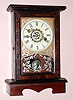 Wm. L. Gilbert Clock Co., Winsted, Conn. "BURL" model one day time and alarm spring driven movement in stained poplar case with grain painted door and Roman numeral painted zinc 4" dial, c1881