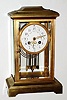 French, Samuel Marti for Bailey Banks and Biddle, Philadelphia PA, C.1913, Brass crystal regulator with 8-day time and strike mvmt and 2-glass vial pendulum.