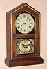 Jerome and Co., (New Haven), "TUSCAN", C.1880, 8-day time and strike gothic style mantel clock with gilt wood accents to the rosewood case.