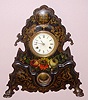 Unsigned, most likely American Clock Co., NY, large iron front, 30 hour, gong striking. This is the same iron case as shown in "A Treasury of American Clocks", pg 178, fig 395. The case would have been available to several Connecticut clock firms, C.1860