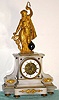 French gilt figural mantel clock with conical pendulum 8 day time and strike spring driven movement in soft white marble case surmounted by Greek figure holding pendulum, possibly Hygieia the goddess of good health, bearing a serpent entwined staff with Roman numeral porcelain chapter ring and exposed movement, sNo. 70867 c1850