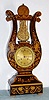 French lyre form mantel clock with 8 day time and strike spring driven movement in rosewood case with satin inlay and ET Roman numeral gilt metal dial and Breguet style moon hands, c1880