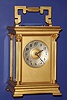 French, Brass Cased Carriage clock, large, over 10 inches tall, retailed by Folkard and Son, Brighton, and in a 4-column Anglaise style case, 8-day time and gong strike.