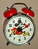 Mickey Mouse mechanical alarm clock automaton with Mickey's hands indicating the hours and minutes and his head ticking, licensed by Walt Disney Productions copyright 1977 Made in France and new old stock, c1977