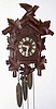 German, Hubert Herr, Triberg cuckoo clock 30 hour, three train, quarter strike weight driven movement with cuckoo and quail, case w/ two bird and six leaf motif, c1910