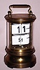 Ansonia Clock Co., PLATO No. 1, digital novelty clock; the cental shaft rotates once per hour and the number plates are released as it turns.