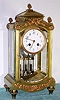 French, S. Marti and Cie, for Harris and Harrington-NY, 4-glass CRYSTAL REGULATOR, in a fancy pediment top case with cast berry finials and other applied scrolly trim, 8-day, gong strike, finely tooled gilt hands.
