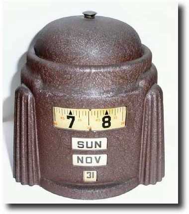 C.1940, Lux, Annular Dial alarm clock with manual calendar — Antique Clocks Price Guide