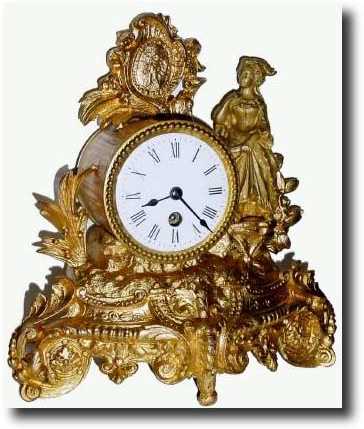 C.1900, French, Gilt White Metal figural clock — Antique Clocks Price Guide