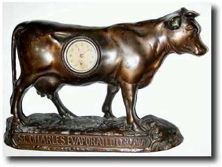 C.1930, Novelty of a bronzed iron cow figure advertising shelf clock — Antique Clocks Price Guide
