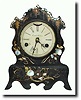 C.1853, E. and A. Ingraham. Miniature Iron case shelf clock