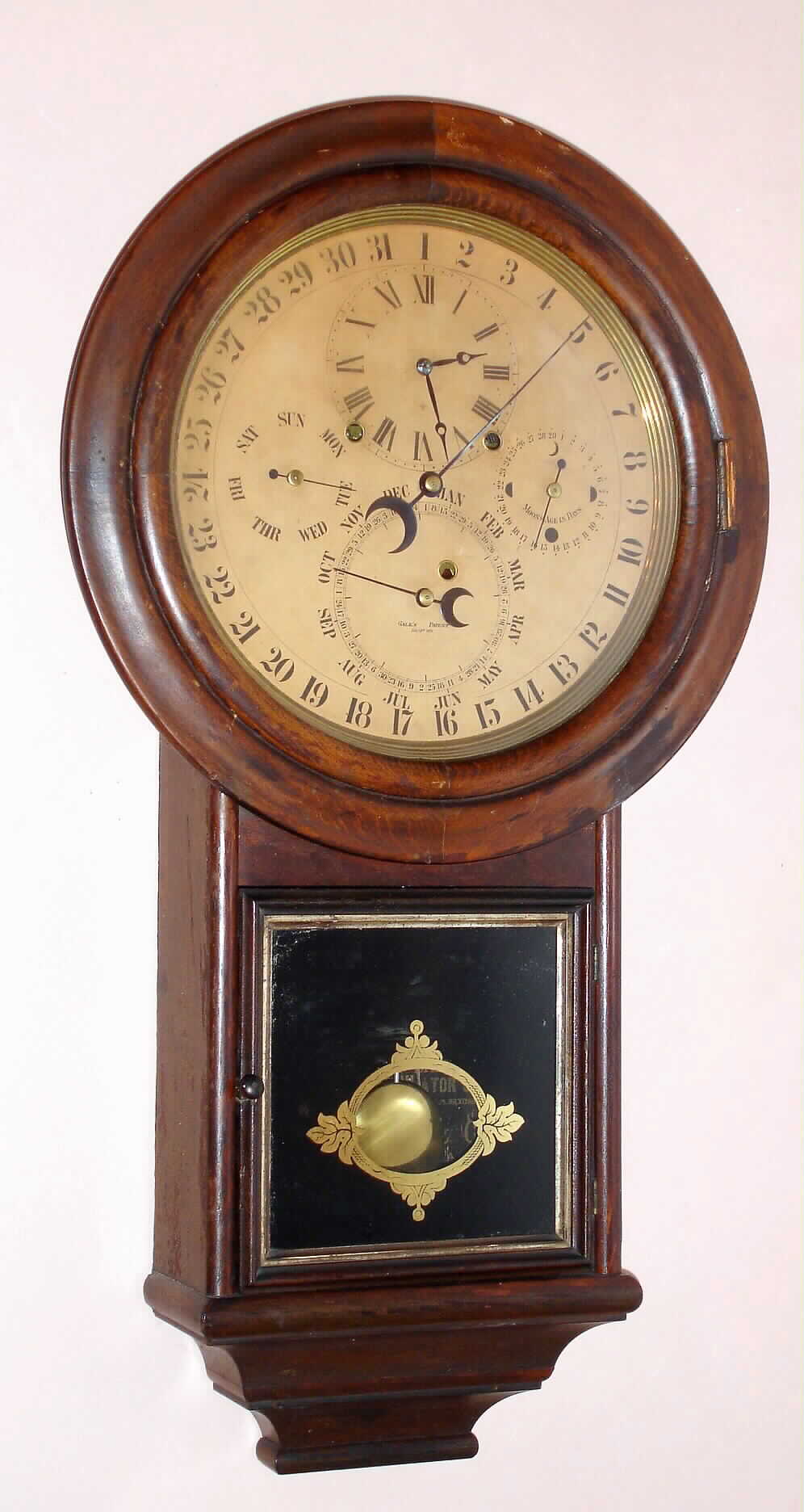 D. J. Gale, patent "Gale Drop No. 2", mfg'd by Welch, Spring and Co., Bristol, astronomical indications with age of the moon, day, date and month. Note this clock has an early paper dial without the equation of time chart inside the month ring, C.1871. (See another example in today's sale with the equation chart present) — Antique Clocks Price Guide