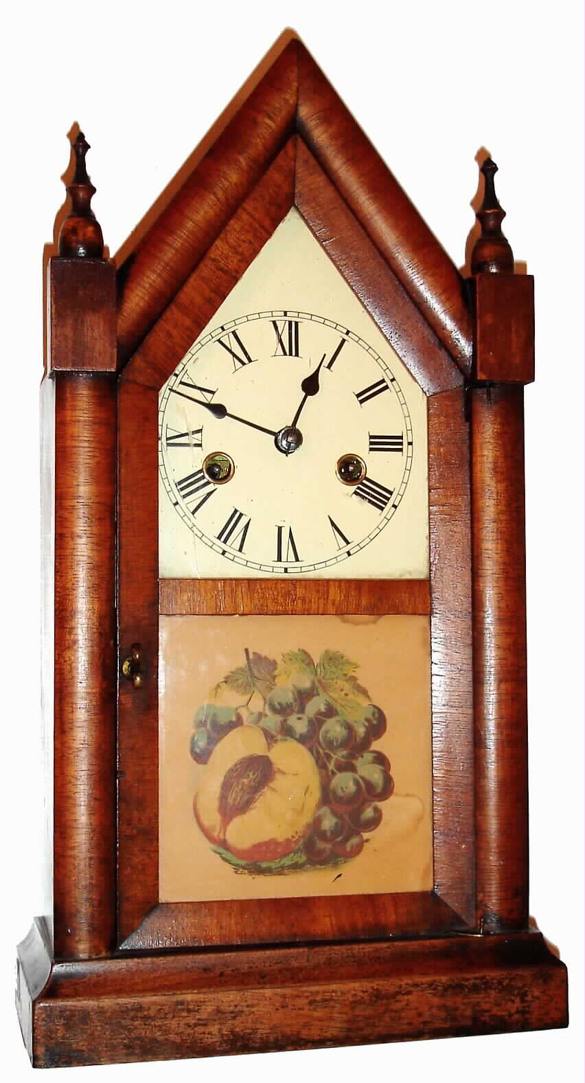 E.N. Welch, Forestville, Conn. "Small Sharp Gothic" mahogany-veneer 30-hour time and strike mini-steeple clock, C.1880 — Antique Clocks Price Guide