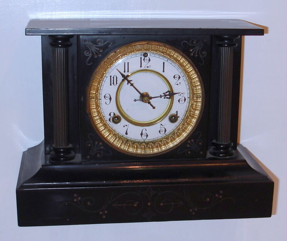 Waterbury Clock Co, Conn. iron 8-day time and strike mantel clock in black enameled case, c1906 — Antique Clocks Price Guide