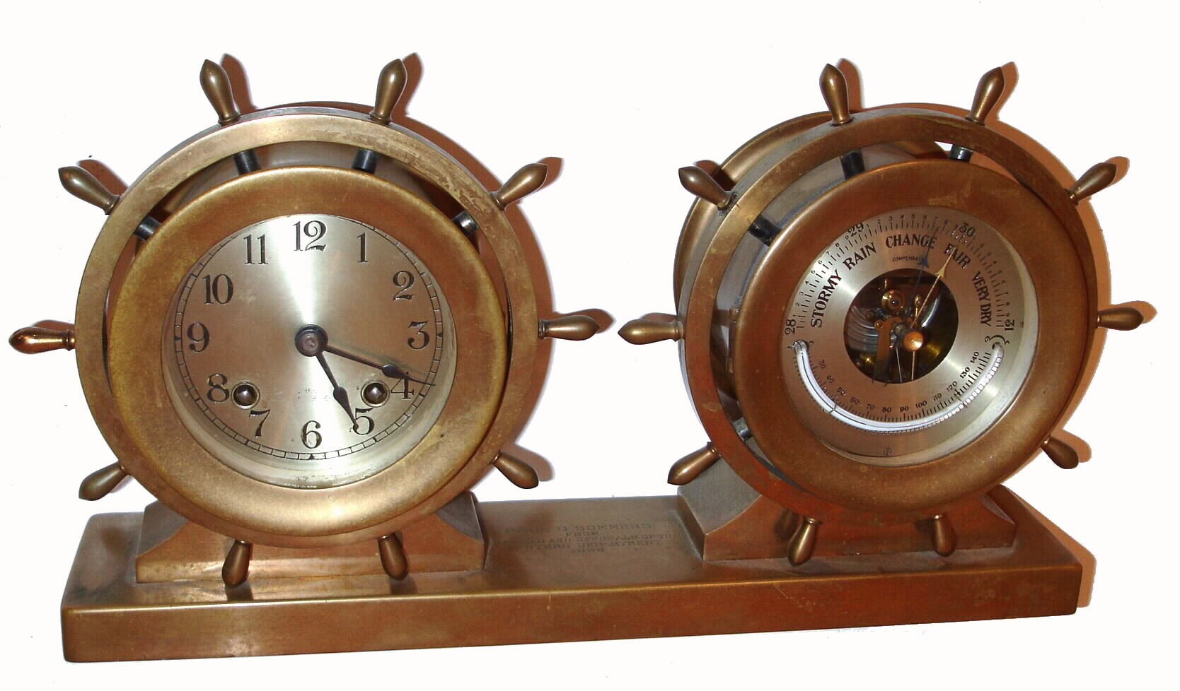 Chelsea Clock Co., Chelsea Mass., ship's bells 8-day brass yacht wheel clock and barometer set on bronze base, C.1937. — Antique Clocks Price Guide