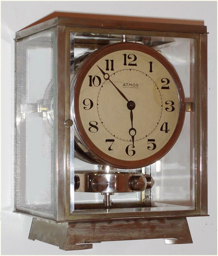 French, J.L. Reutter ATMOS clock, atmospheric driven time only movement with torsion pendulum designed using mercury inside a glass tube similar to that of a thermometer to react to sensitive changes in temperature and atmospheric conditions, nickel plated case and Arabic numeral painted dial, serial No. 5398 c1930 — Antique Clocks Price Guide