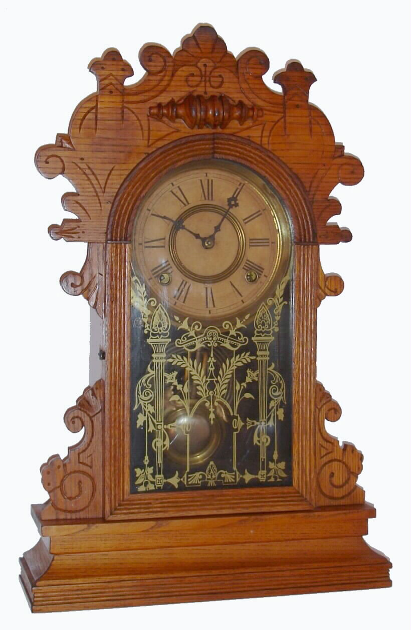 Wm.L. Gilbert Clock Co., Winsted Conn., oak gingerbread 8-day time and strike kitchen clock, C.1895. — Antique Clocks Price Guide
