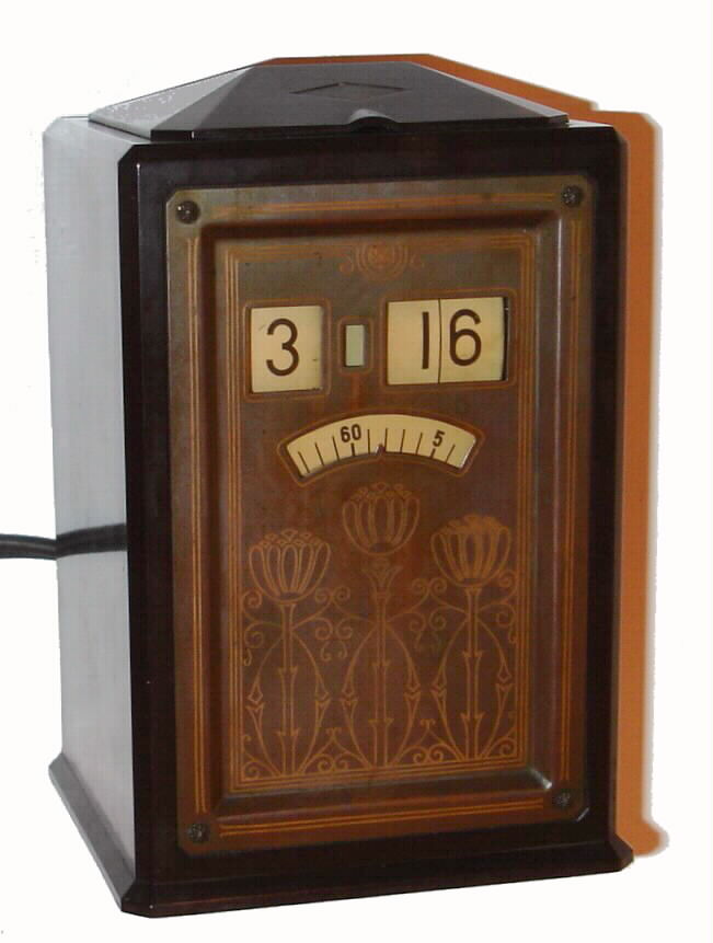 General Electric "Executive" plug-in brown "Textolite" novelty clock, AB8B02, C.1933. — Antique Clocks Price Guide