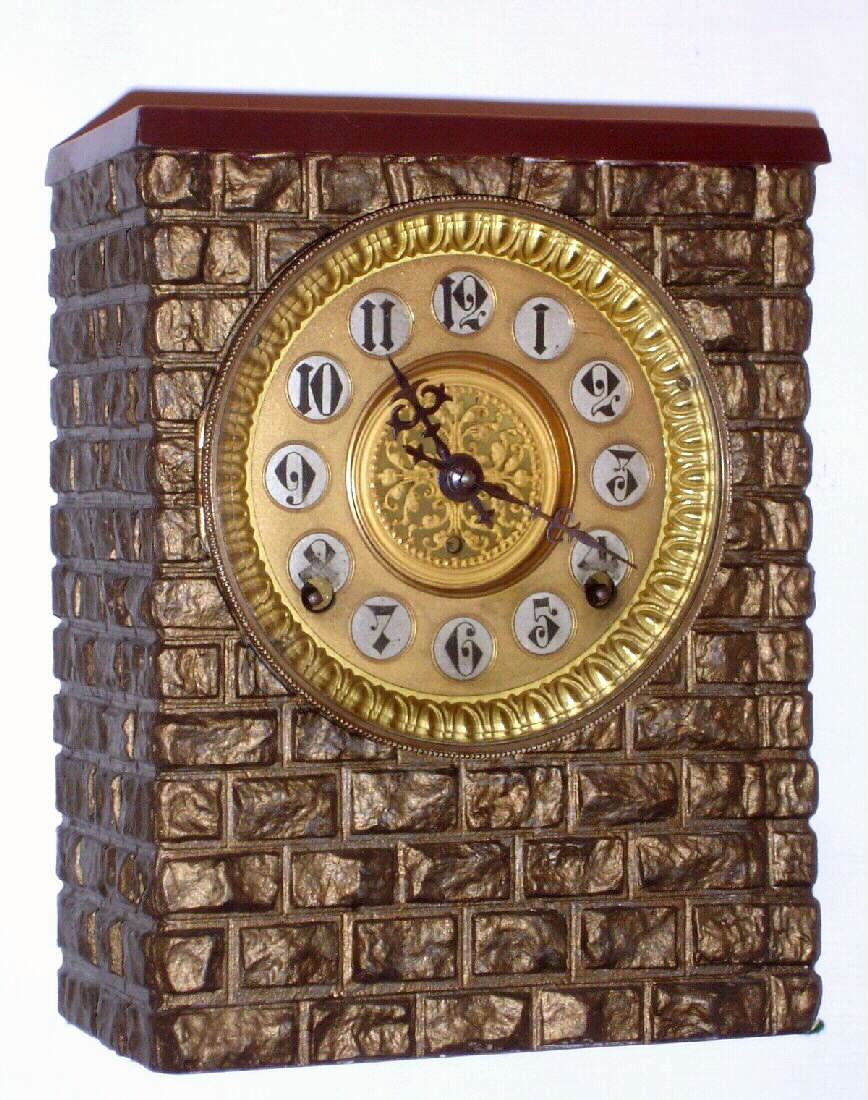 F. Kroeber Clock Co., New York "Indian" 8 day time and strike spring driven Eclipse movement in bronze finished case, c1900 — Antique Clocks Price Guide