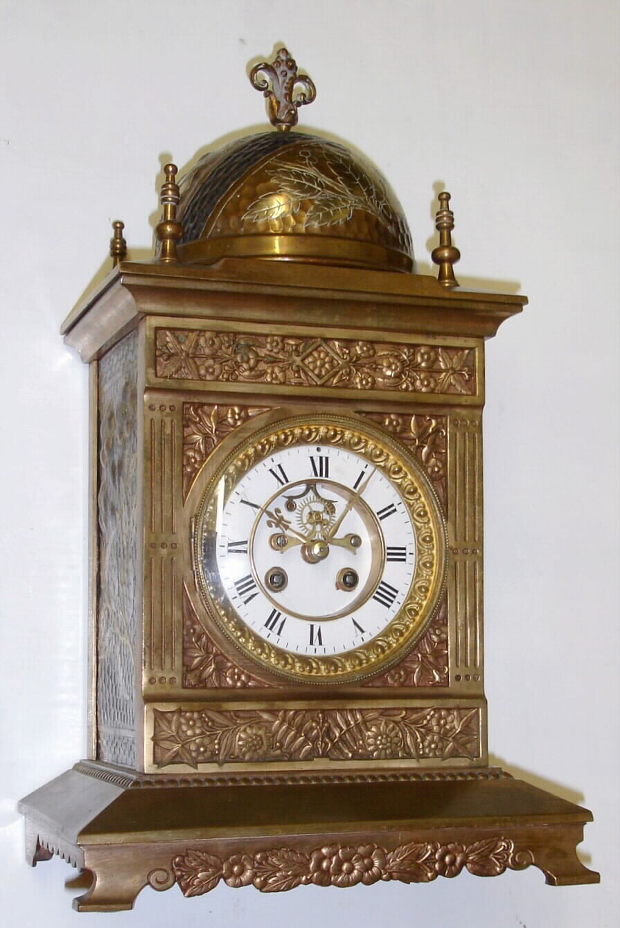French unsigned cast and hammered brass unsigned mantel clock, S. Marti 8-day time and strike movement, c.1890. — Antique Clocks Price Guide