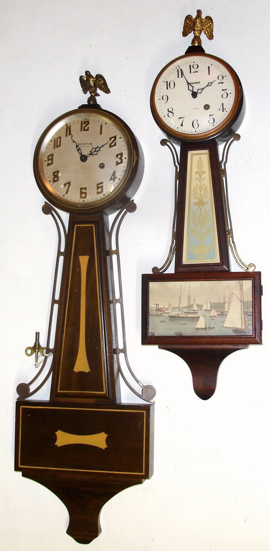 Clocks- (2) banjo clocks: New Haven Clock Co., "Warwick" 8-day time-only balance-wheel mahogany case and an E. Ingraham Co., Bristol, Conn. "B-301" 8-day balance-wheel stained wood case; both C.1930 — Antique Clocks Price Guide