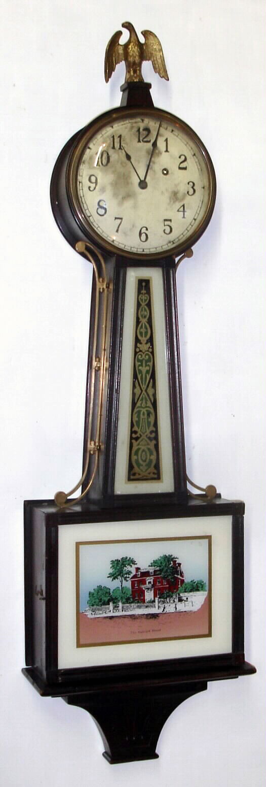 New Haven Clock Co., Conn., 8-day weight-driven time-only full-size mahogany banjo clock, C.1928. — Antique Clocks Price Guide