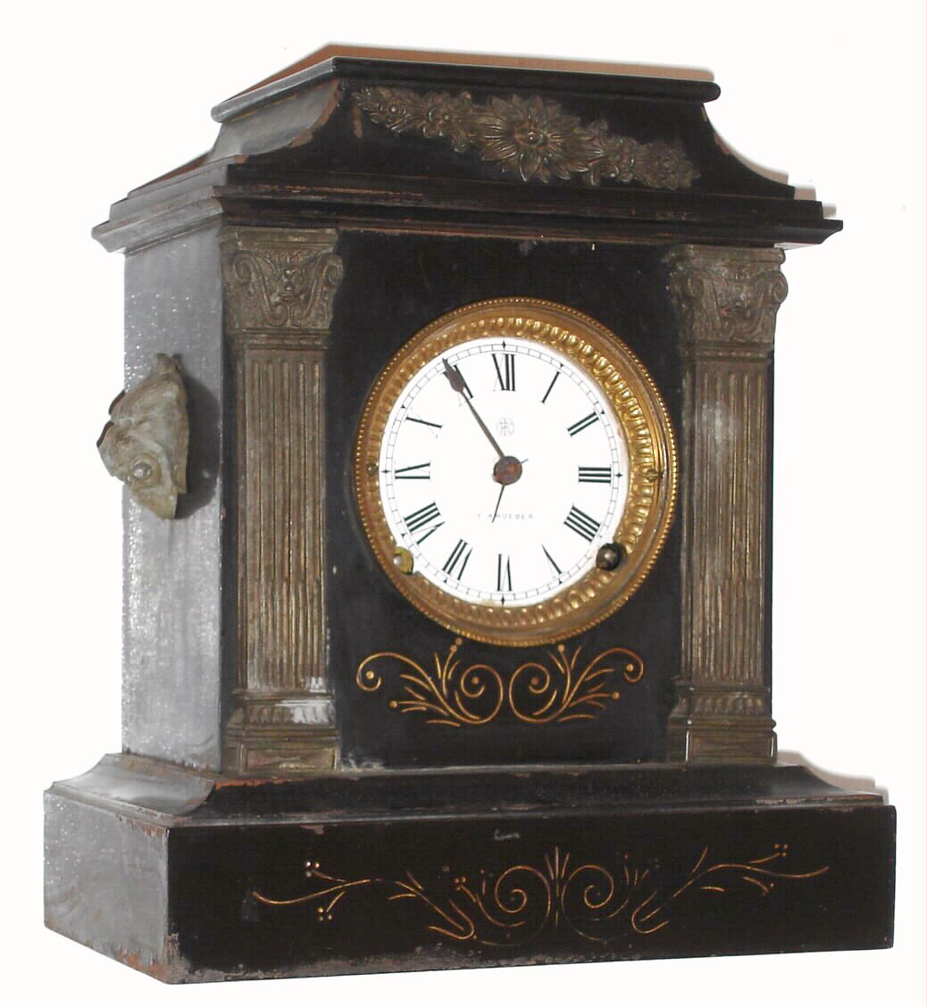F. Kroeber Clock Co., New York, "Naples" mantel clock 8 day time and strike spring driven movement in black enamel cast iron case with cast metal trim, c1885 — Antique Clocks Price Guide