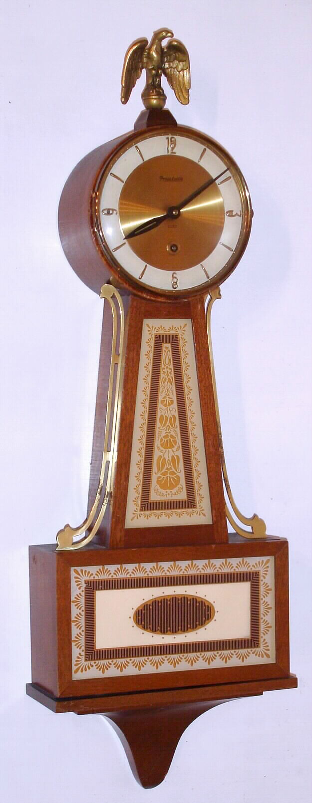 Seth Thomas electric banjo now fitted with German spring drive movement with a Forestville marked dial — Antique Clocks Price Guide