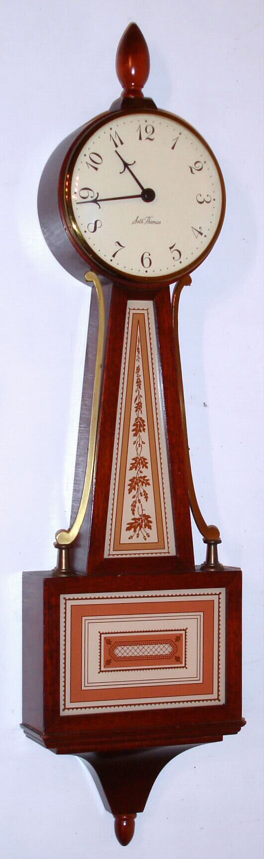 Seth Thomas Clock Co., Thomaston, Conn., C. 1953, "Homestead-2W", 8-day 4-jewel key wound movement banjo timepiece. — Antique Clocks Price Guide